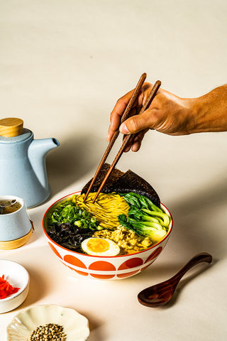 KYUNU Rulebreaker Protein Noodle, Original Flavor in Garlic Shio Protein Ramen Kit tablescape with condiments