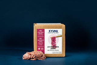 KYUNU Rulebreaker Protein Noodles, Beet Flavor box with noodle nest next to it