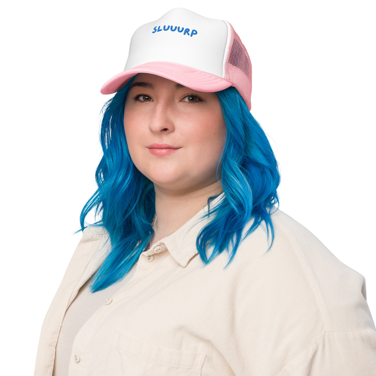 Person with long blue hair wearing the pink Sluuurp trucker hat, front view